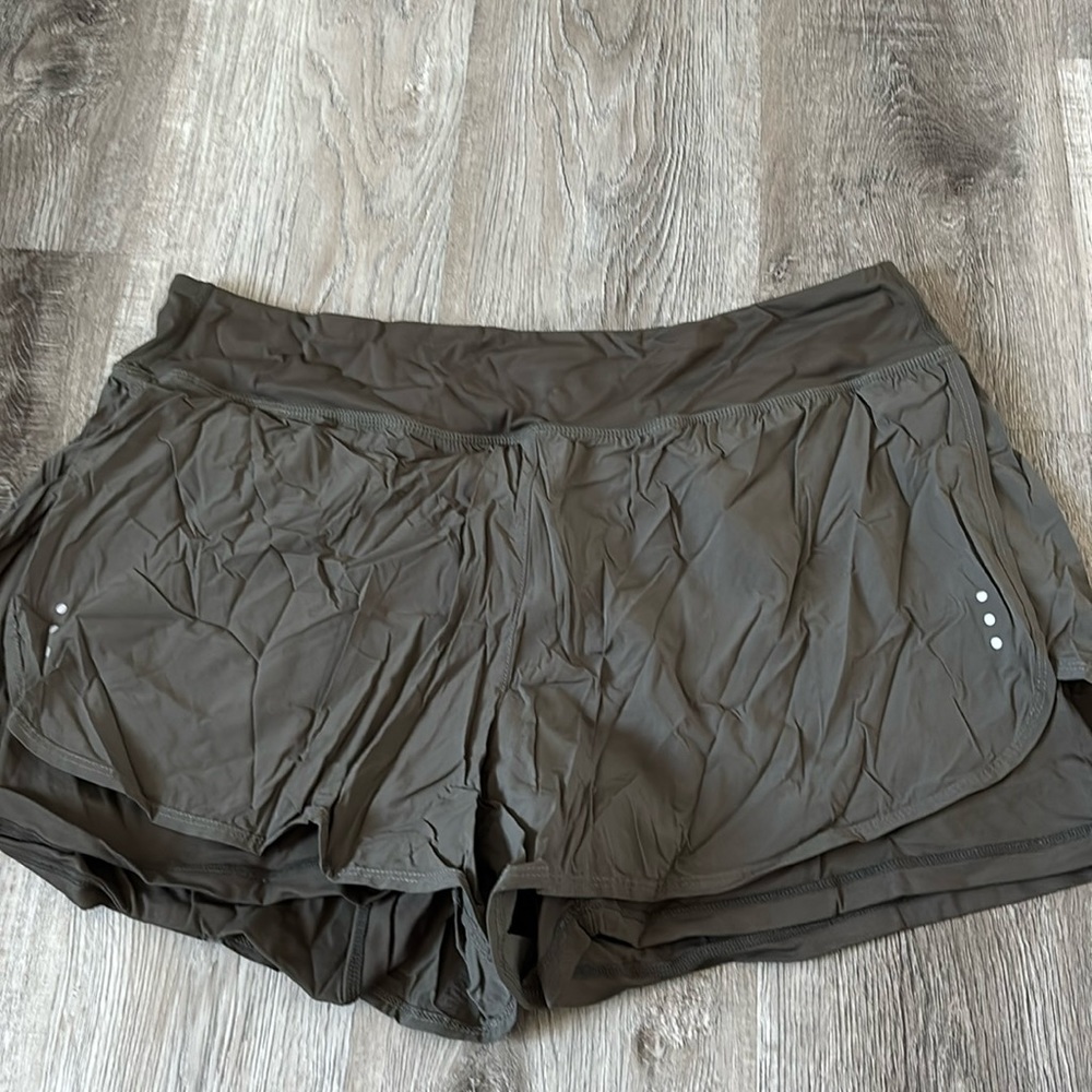Green athletic shorts